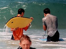 Bodyboarding in polo shirt