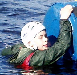 raft capsize wet green anorak